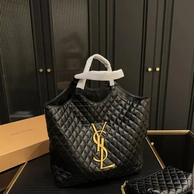 Black quilted leather tote bag with gold hardware