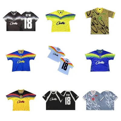 Nine retro football shirts in yellow, blue and patterned colourways